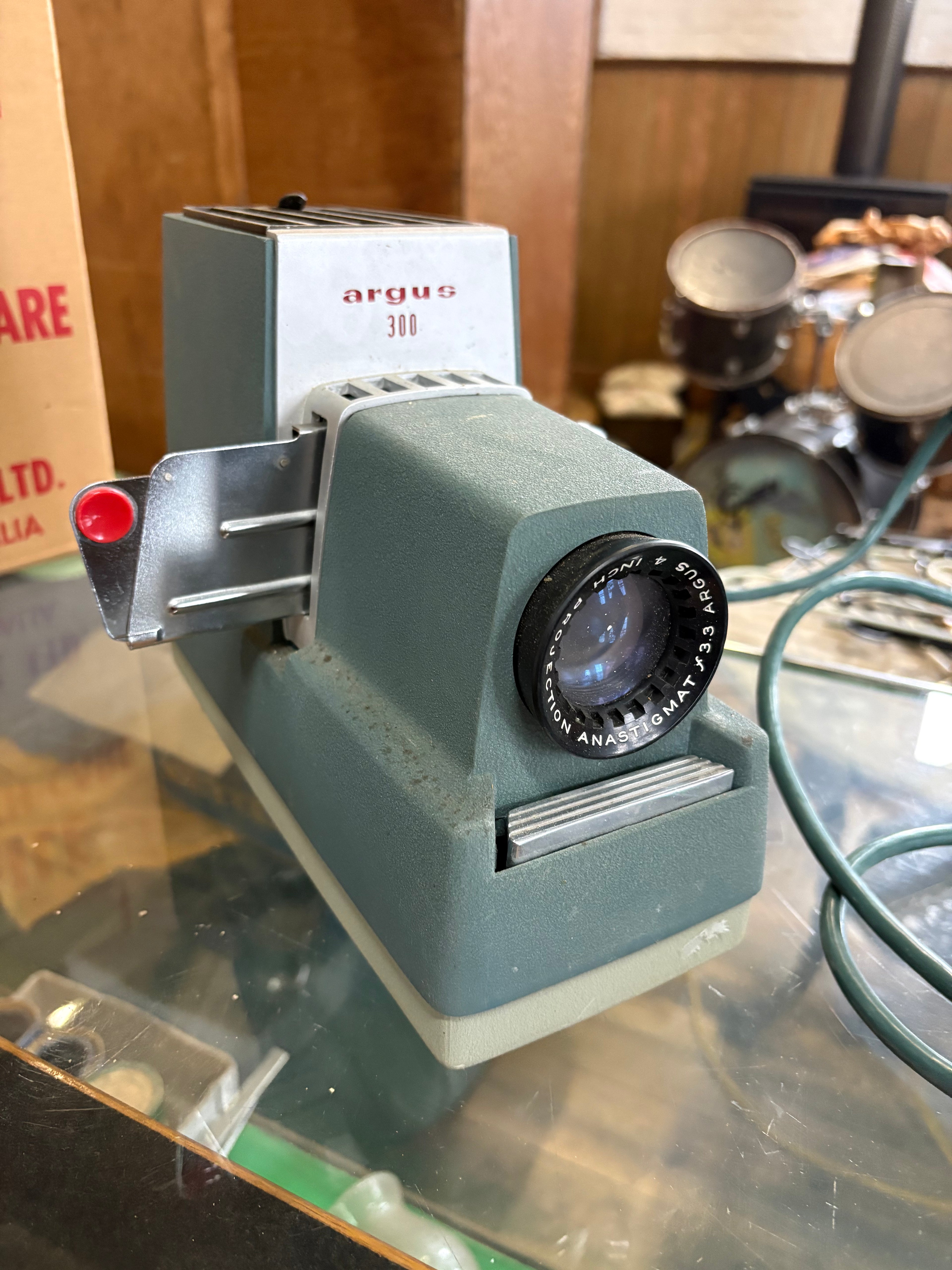 Antique slide projector in box with original manual